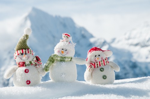 Image snowman with snowman on snow field during daytime