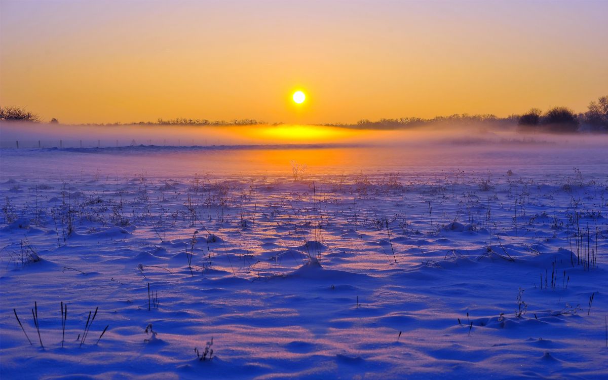 body of water during sunset