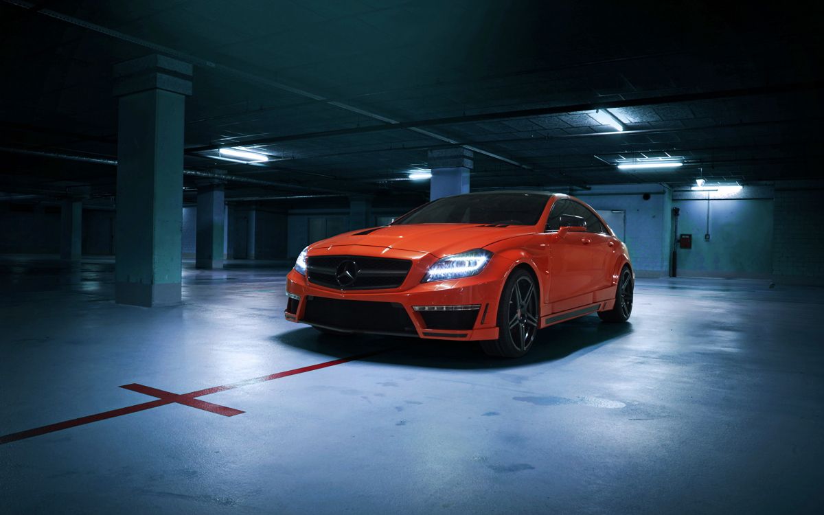 Naranja Bmw m 3 Coupe Estacionado en un Piso Blanco. Wallpaper in 2560x1600 Resolution