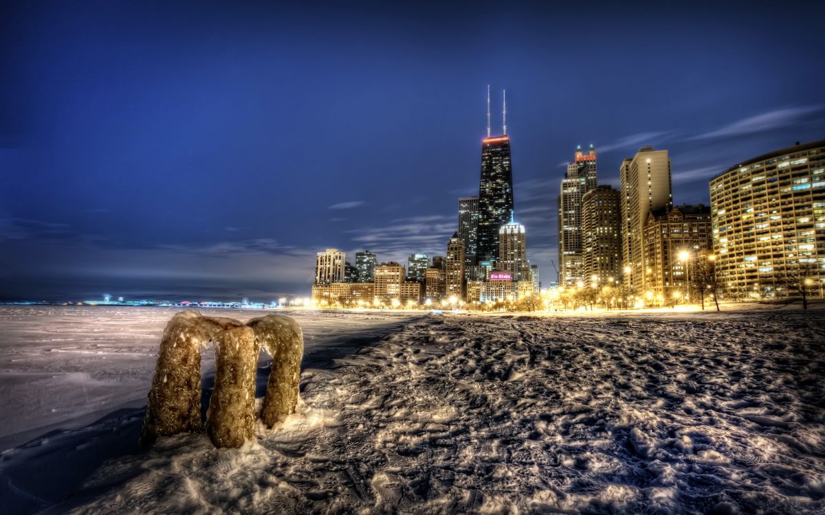 city skyline during night time