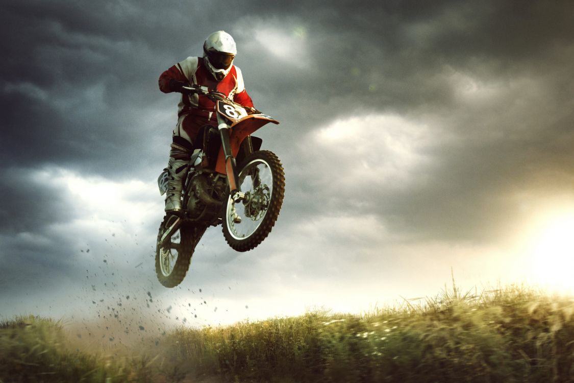 Homme en Costume de Motocross Rouge et Blanc Équitation Motocross Dirt Bike. Wallpaper in 2400x1600 Resolution
