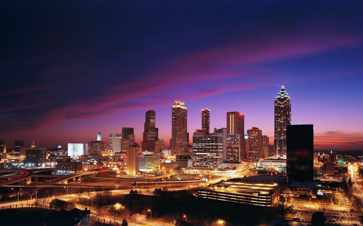 city skyline during night time