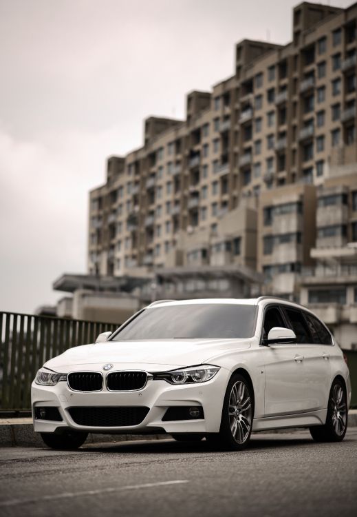 white mercedes benz coupe on road during daytime