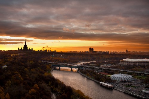 Image aerial view of city during sunset