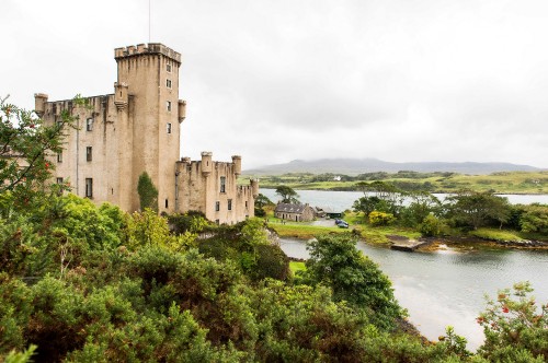 Image gray concrete castle near river during daytime