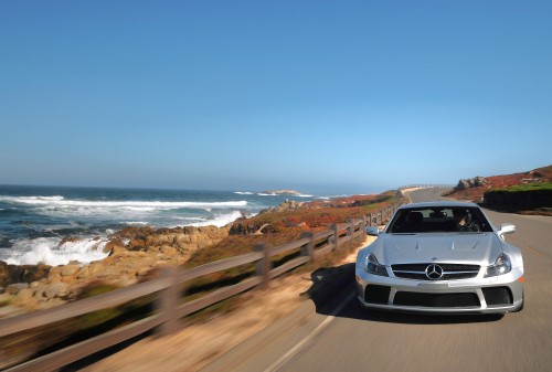 Image white car on road near sea during daytime