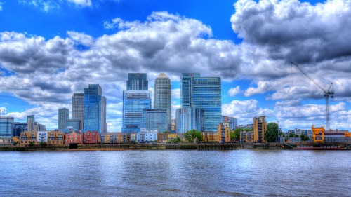 Image city skyline under blue and white cloudy sky during daytime