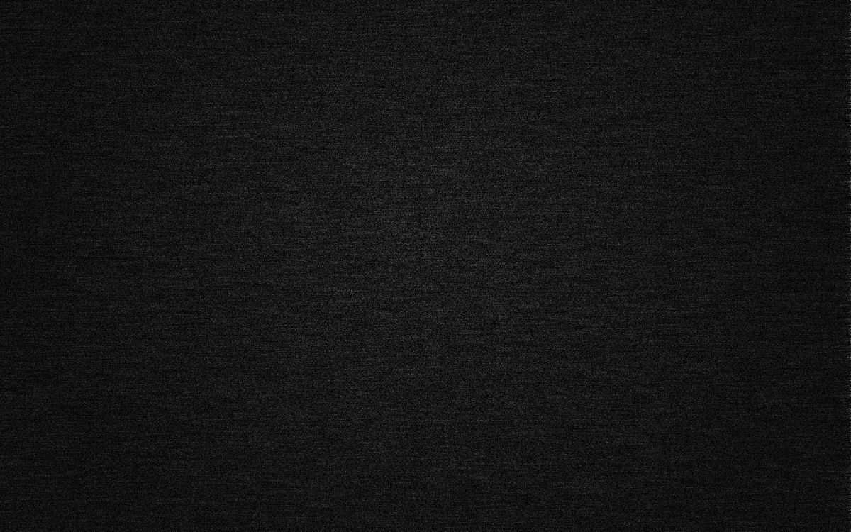 black textile in dark room