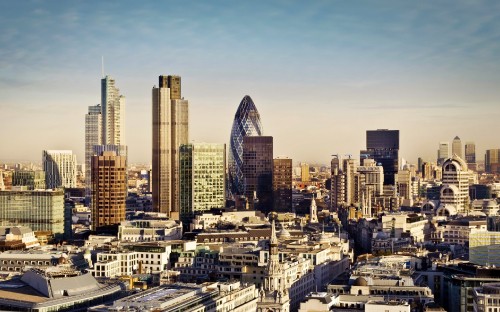 Image city skyline under blue sky during daytime