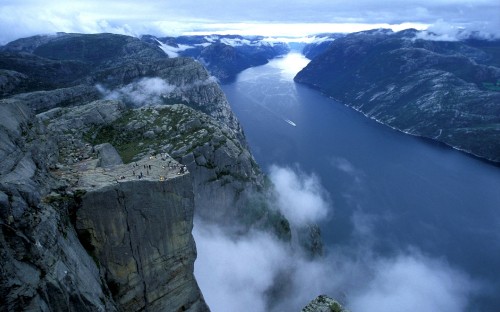 Image aerial view of green mountains and white clouds