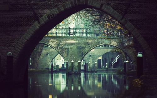 Image brown brick bridge over river