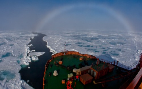 Image red and green ship on sea during daytime