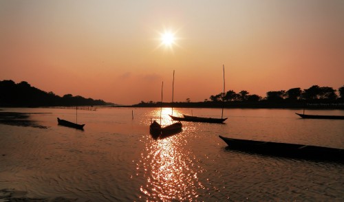 Image silhouette of boat on water during sunset