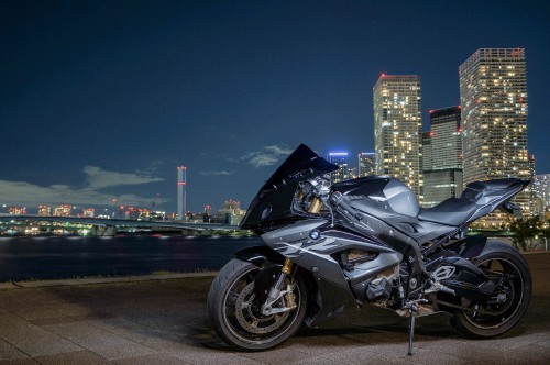 Image black sports bike on road during night time