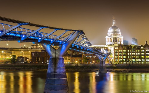 Image bridge over river during night time