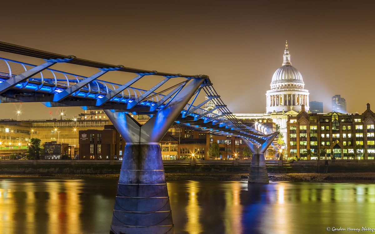 bridge over river during night time