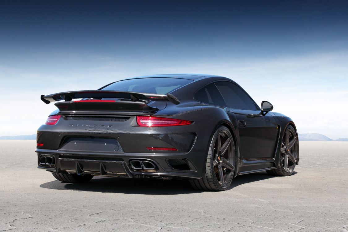 black porsche 911 on gray pavement