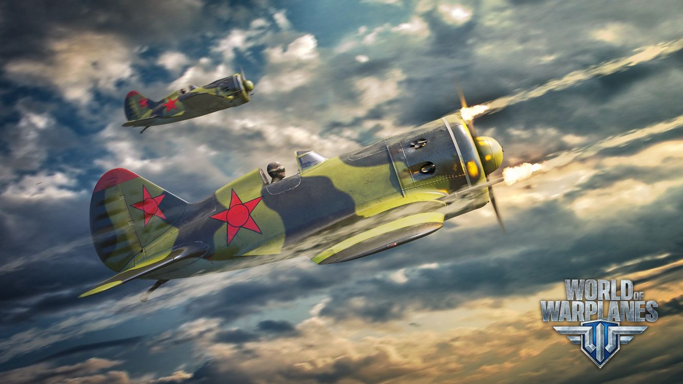 Grünes Und Schwarzes Kampfflugzeug, Das Tagsüber Unter Blauem Himmel Fliegt. Wallpaper in 2560x1440 Resolution