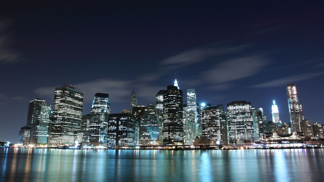 city skyline during night time