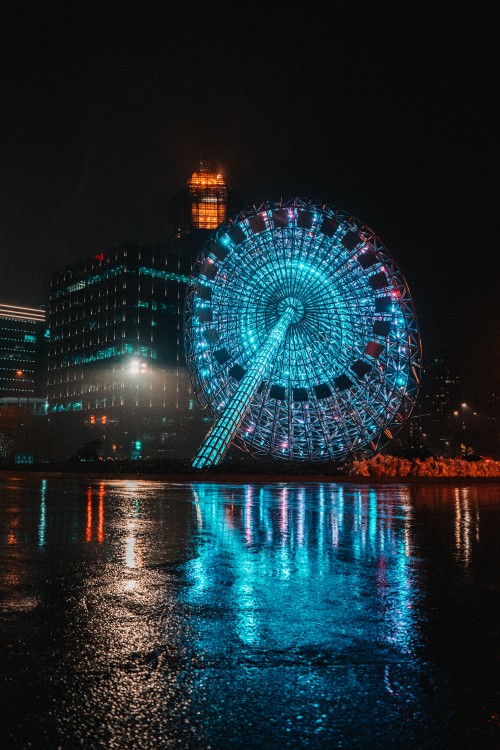 Image blue and white ferris wheel during night time