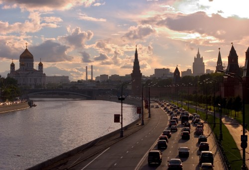 Image city skyline near body of water during daytime