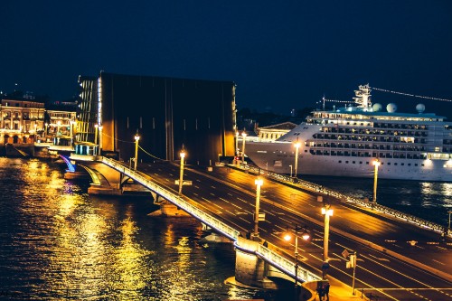 Image white cruise ship on dock during night time