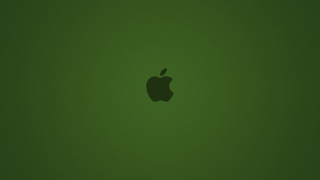 Apple Logo on Green Surface. Wallpaper in 2560x1440 Resolution