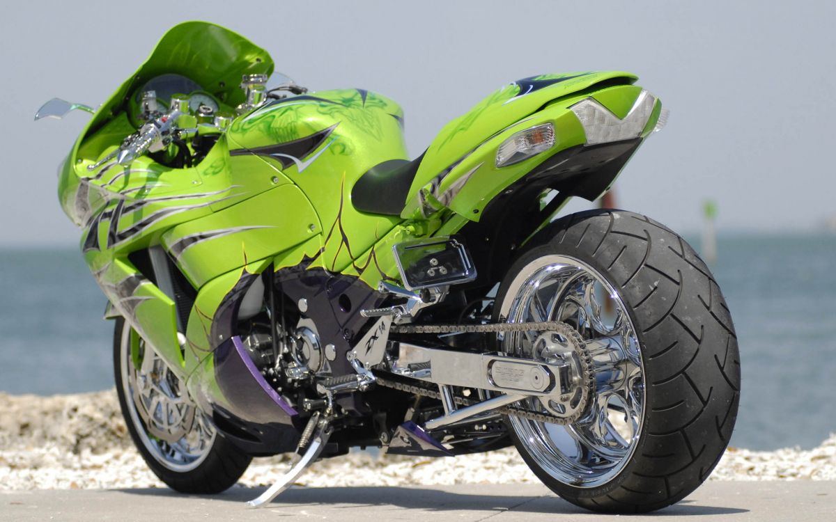 green and black sports bike