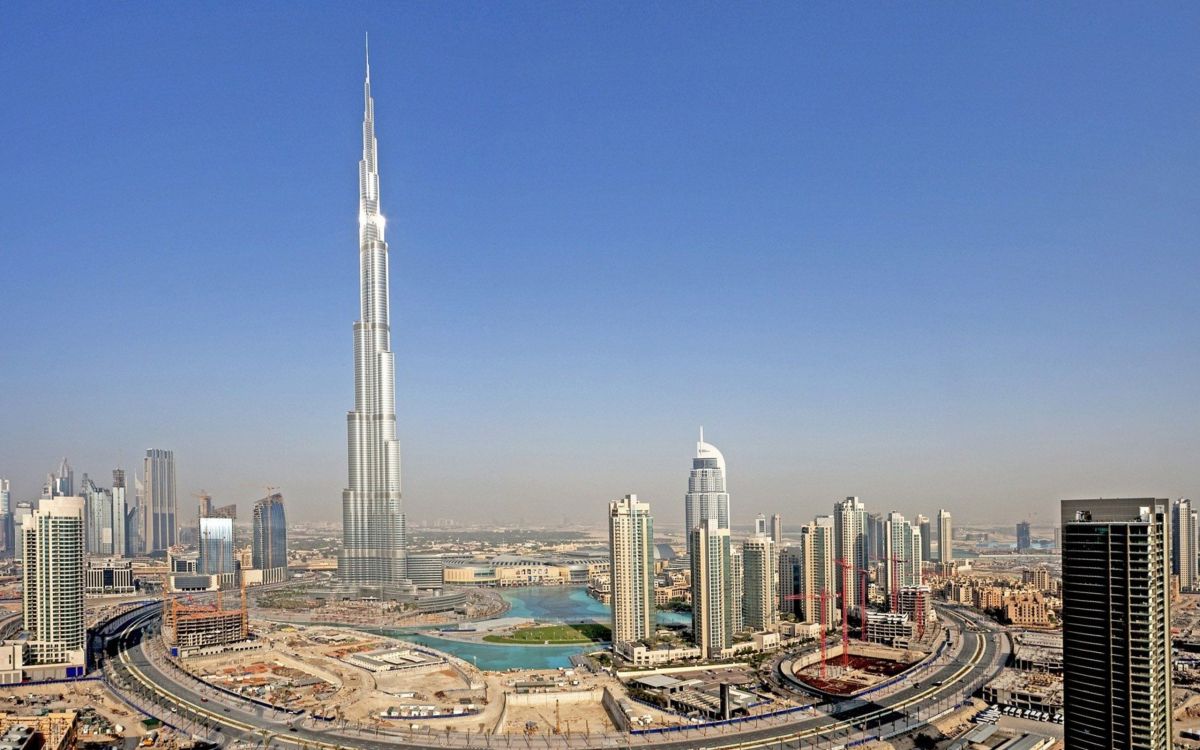 city skyline under blue sky during daytime