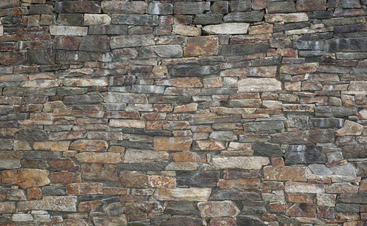 brown and gray brick wall