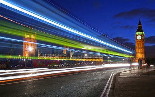 Image time lapse photography of cars on road during night time