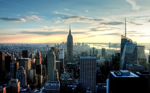 Image city skyline under white clouds during daytime