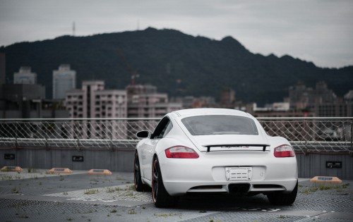 Image white porsche 911 on road during daytime