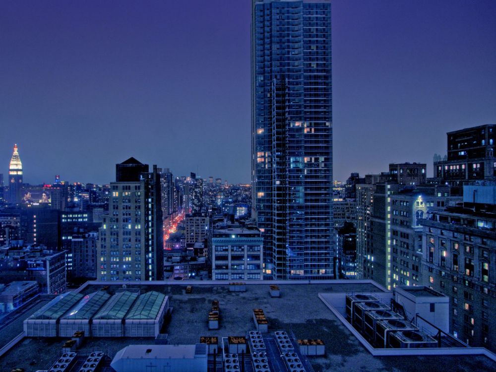 city skyline during night time