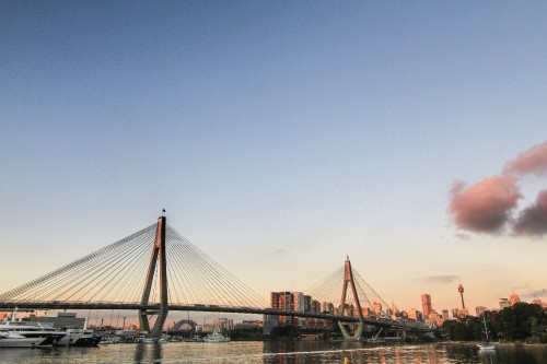 Image bridge over body of water during daytime