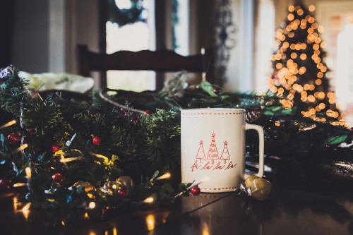 Image white and red ceramic mug on table