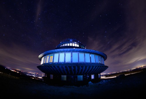 Image blue and white building under starry night