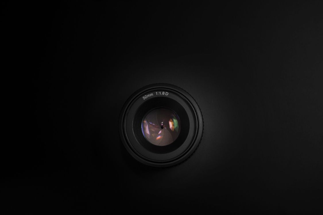 Black Camera Lens on Black Surface. Wallpaper in 5564x3709 Resolution