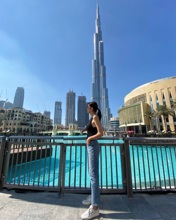 burj khalifa at night, clothing, body of water, human, leg