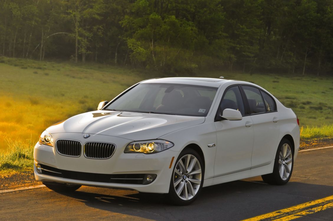 white bmw m 3 coupe on road during daytime