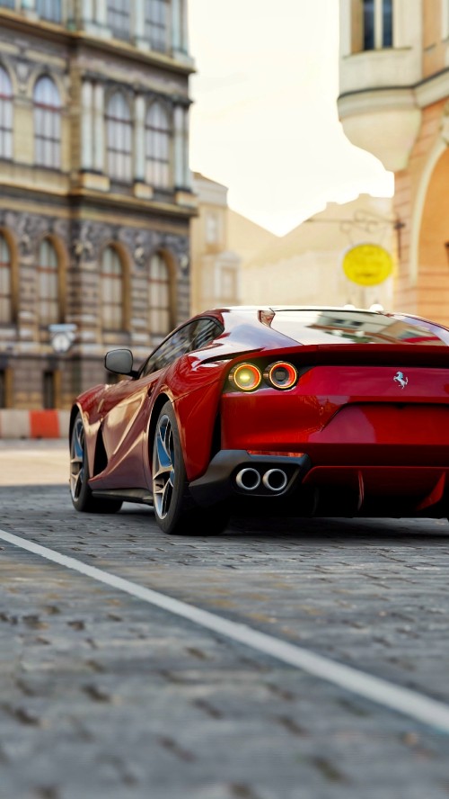 Image red ferrari 458 italia parked on street during daytime