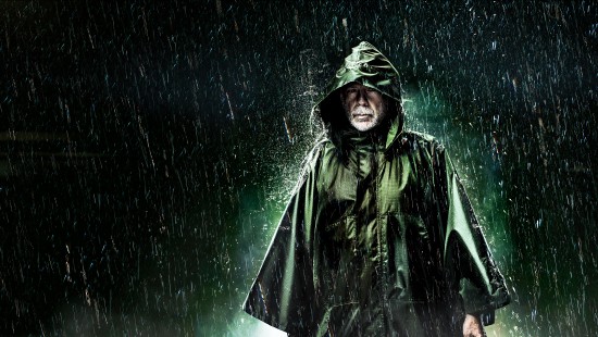Image man in green hoodie under starry night