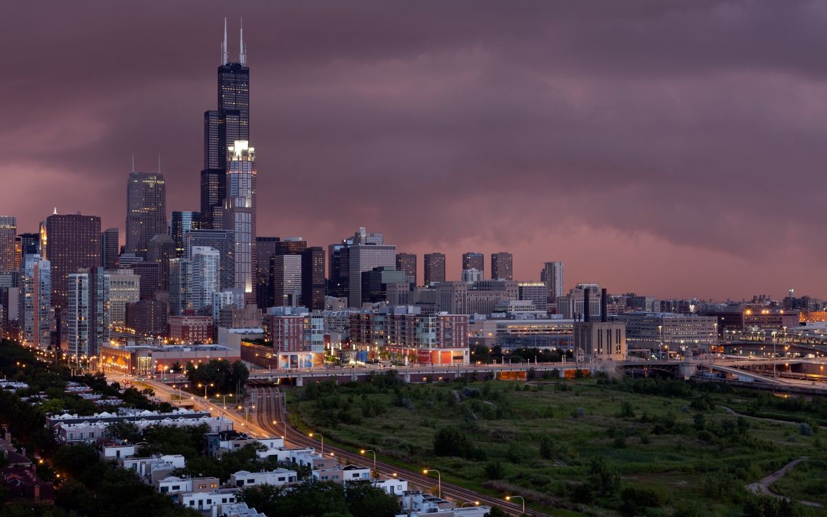 city buildings under gray sky during daytime