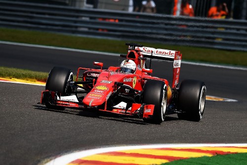 Image red and black f 1 race car on track