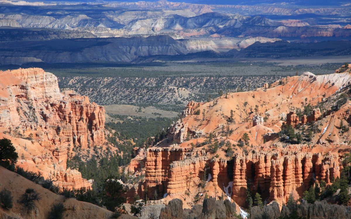 brown rocky mountain under blue sky during daytime