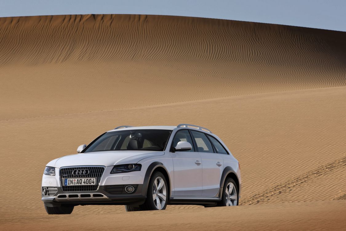 silver bmw x series on desert