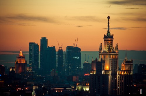 Image city with high rise buildings during sunset