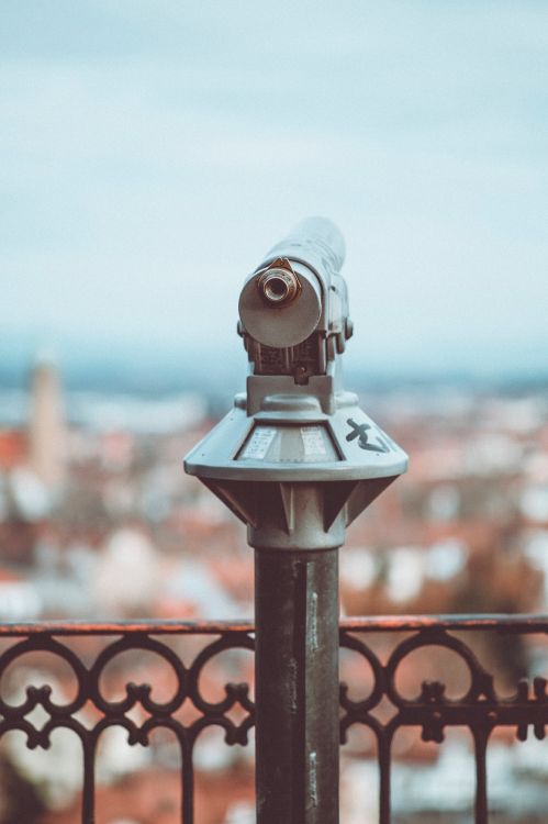 gray and black telescope during daytime