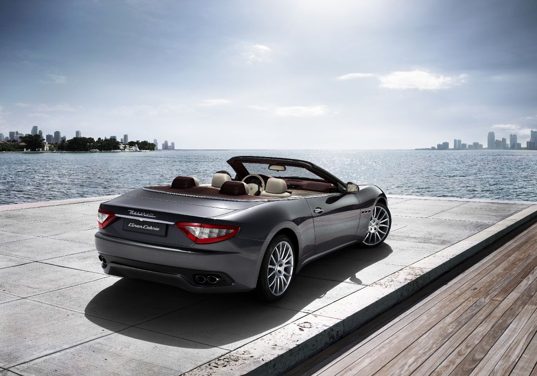 Silver Mercedes Benz Convertible Coupe Parked on Dock During Daytime. Wallpaper in 5079x3555 Resolution