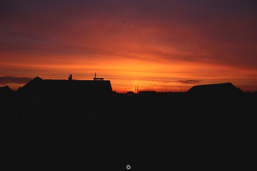 Image silhouette of building during sunset